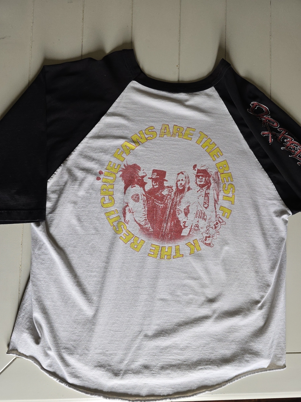 Black & White Raglan Short Sleeve Tee with Yellow-Red Graphic